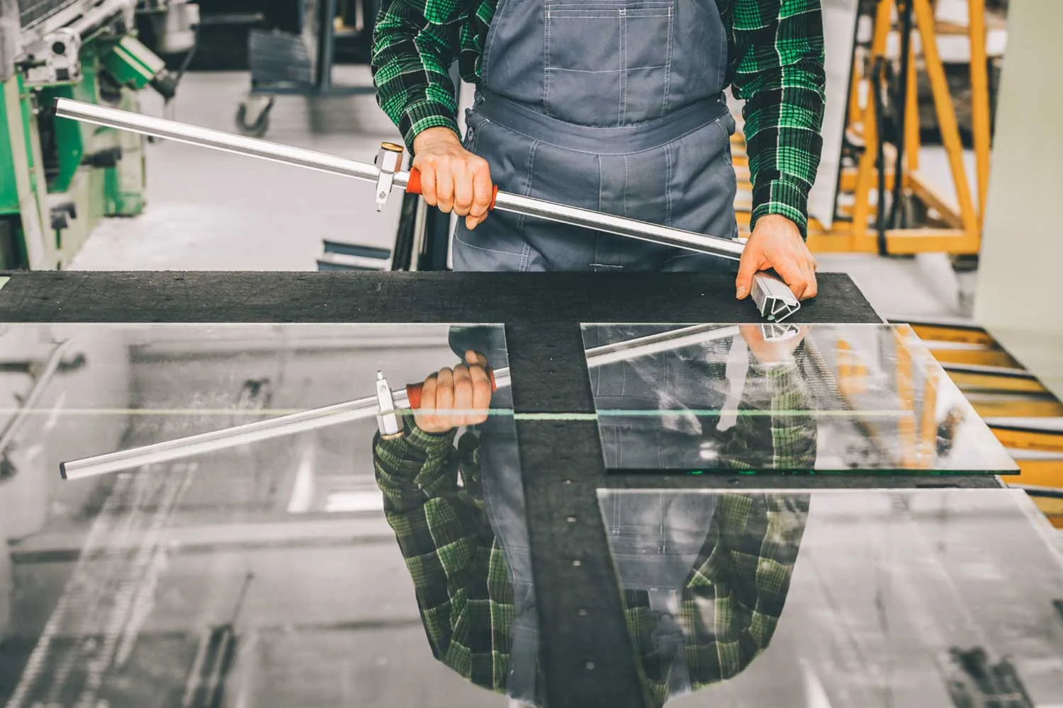 Man cutting glass in Cambridge