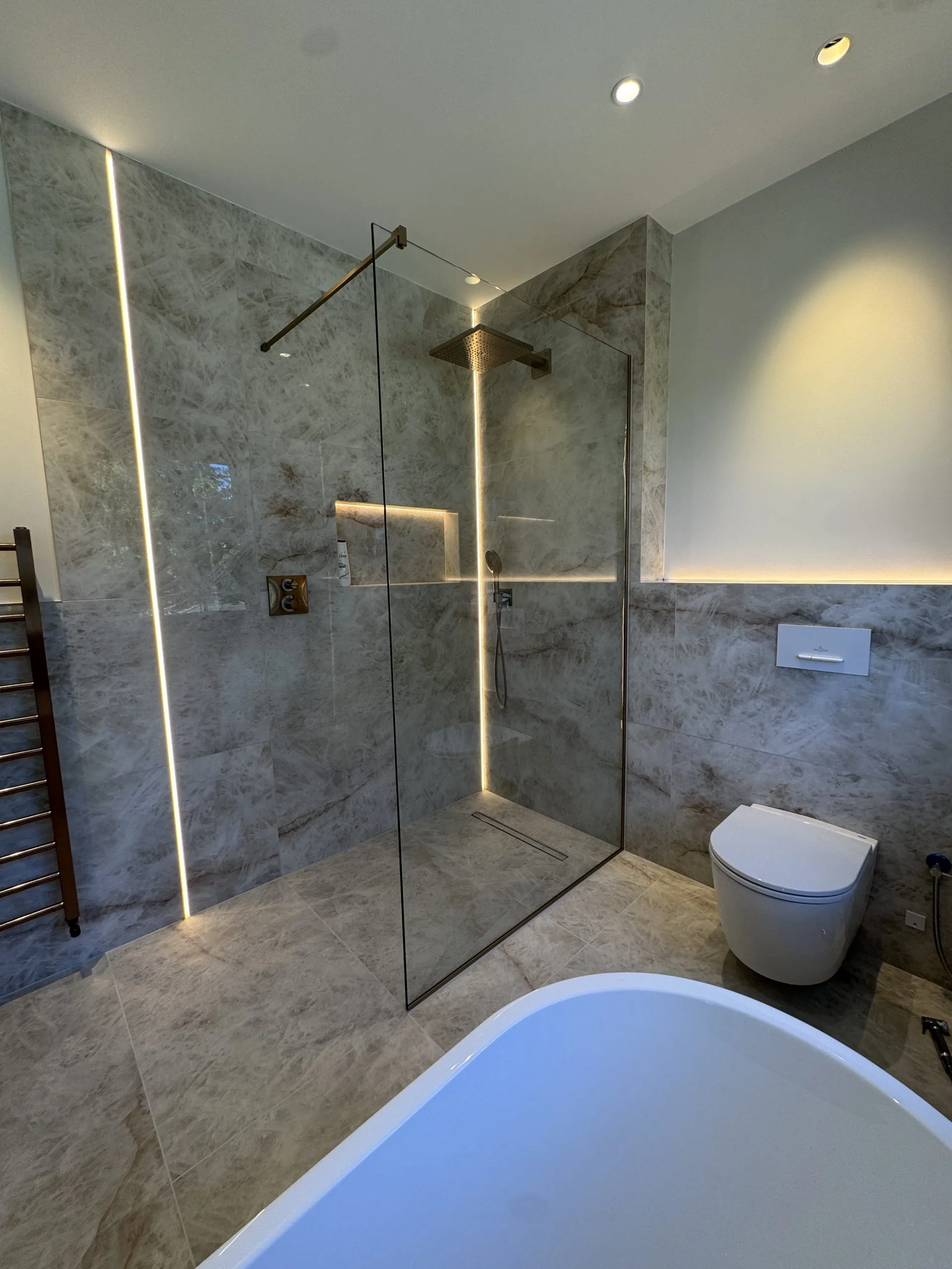 Frameless glass shower enclosure Cambridgeshire