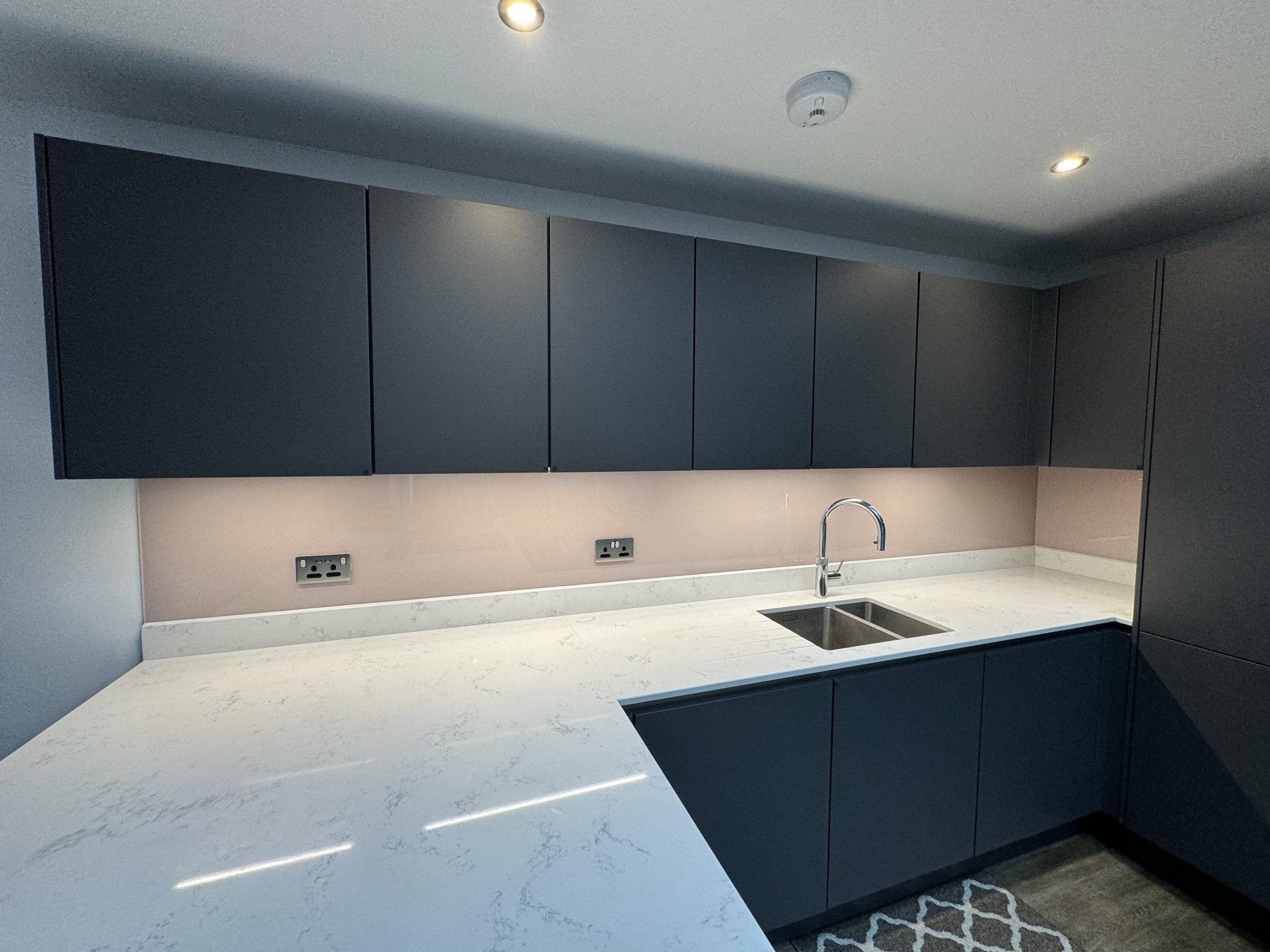 Pink painted Glass Splashback Ely