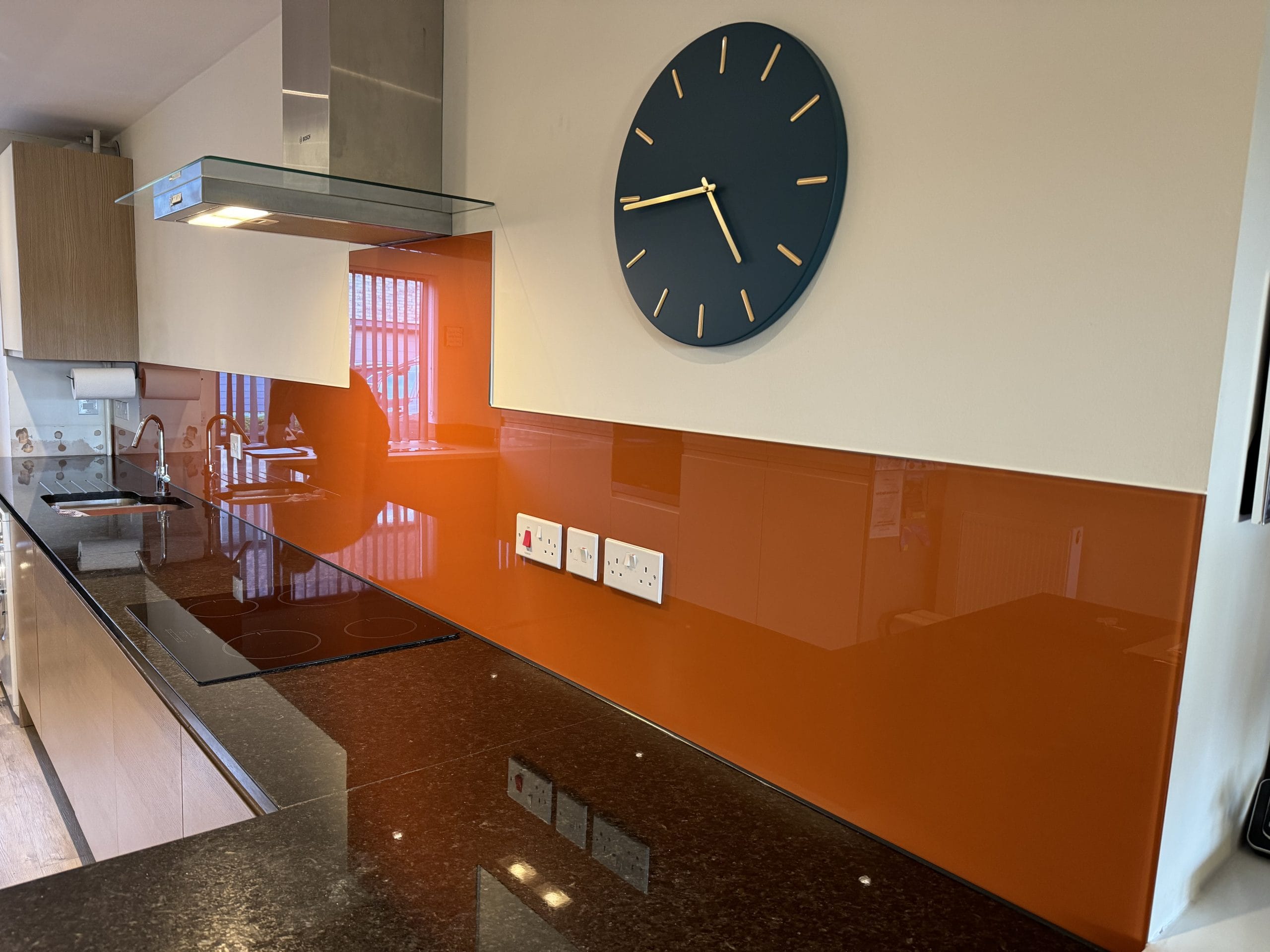 Orange Painted Glass Splashback in Cambridge