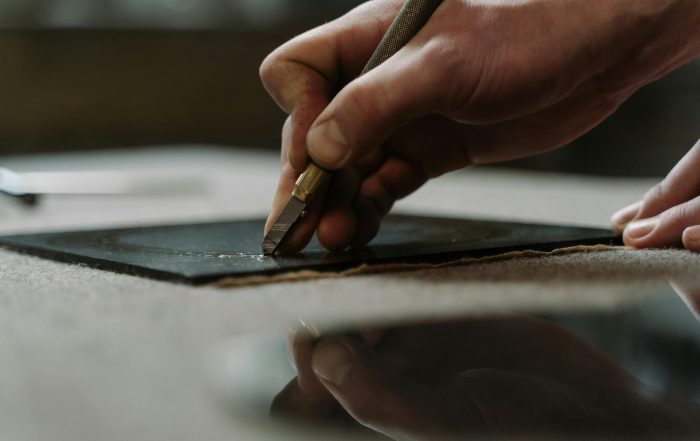 Man cutting glass in Cambridge