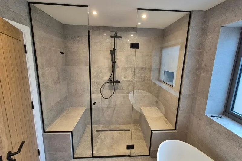frameless_shower_enclosure_Cambridge Black framed shower enclosure in a bathroom